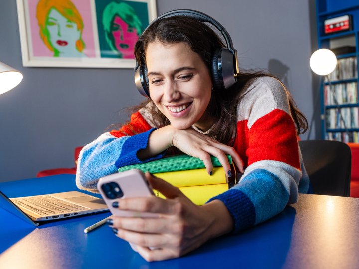 student looking at their phone