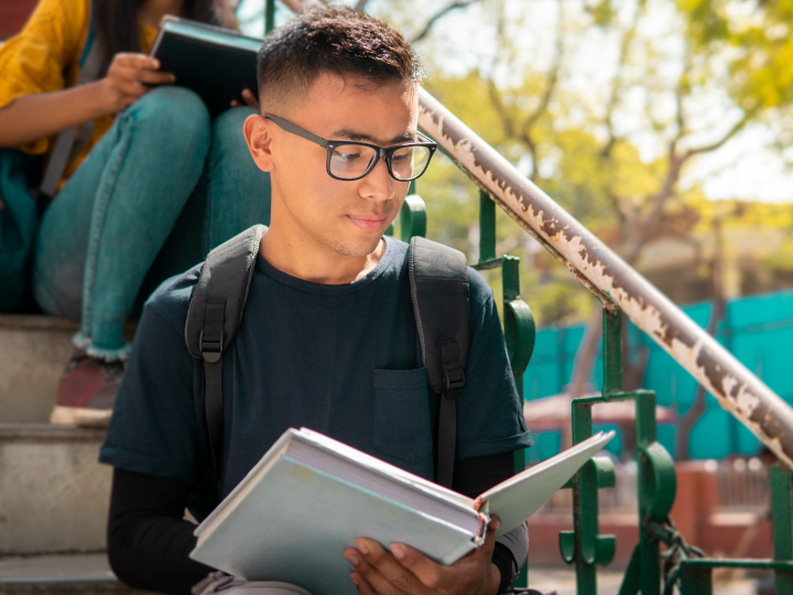 college student reading book